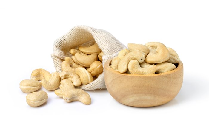 Cashew,Nuts,In,Wooden,Bowl,And,Sack,Bag,Isolated,On