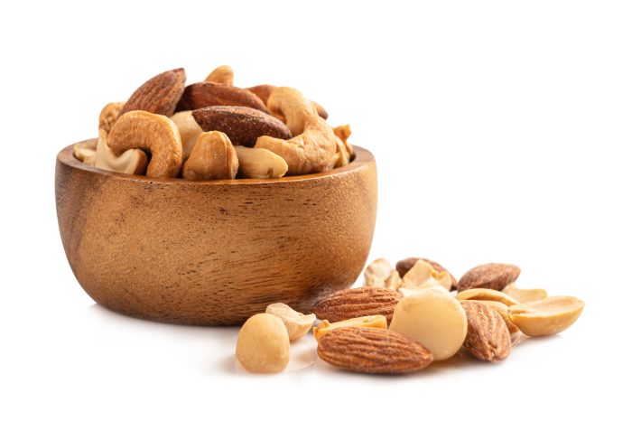 Mixed,Nuts,In,Wooden,Bowl,Isolated,On,White,Background.